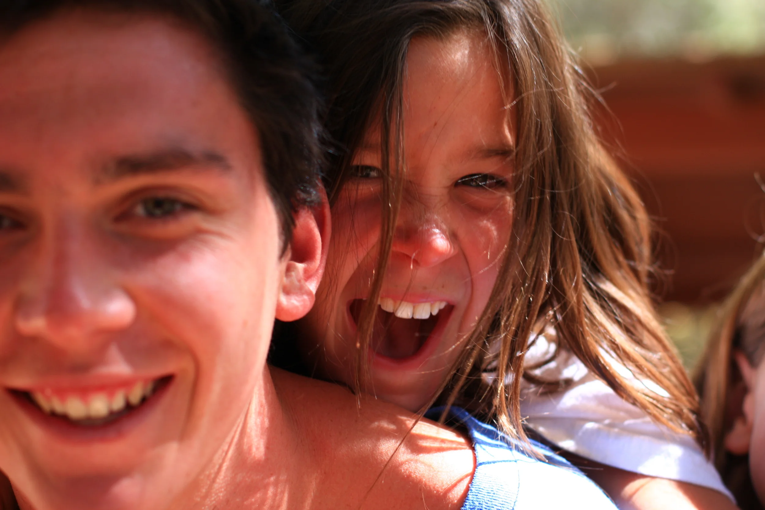 Laughing Summer Camp Counselor and Camper