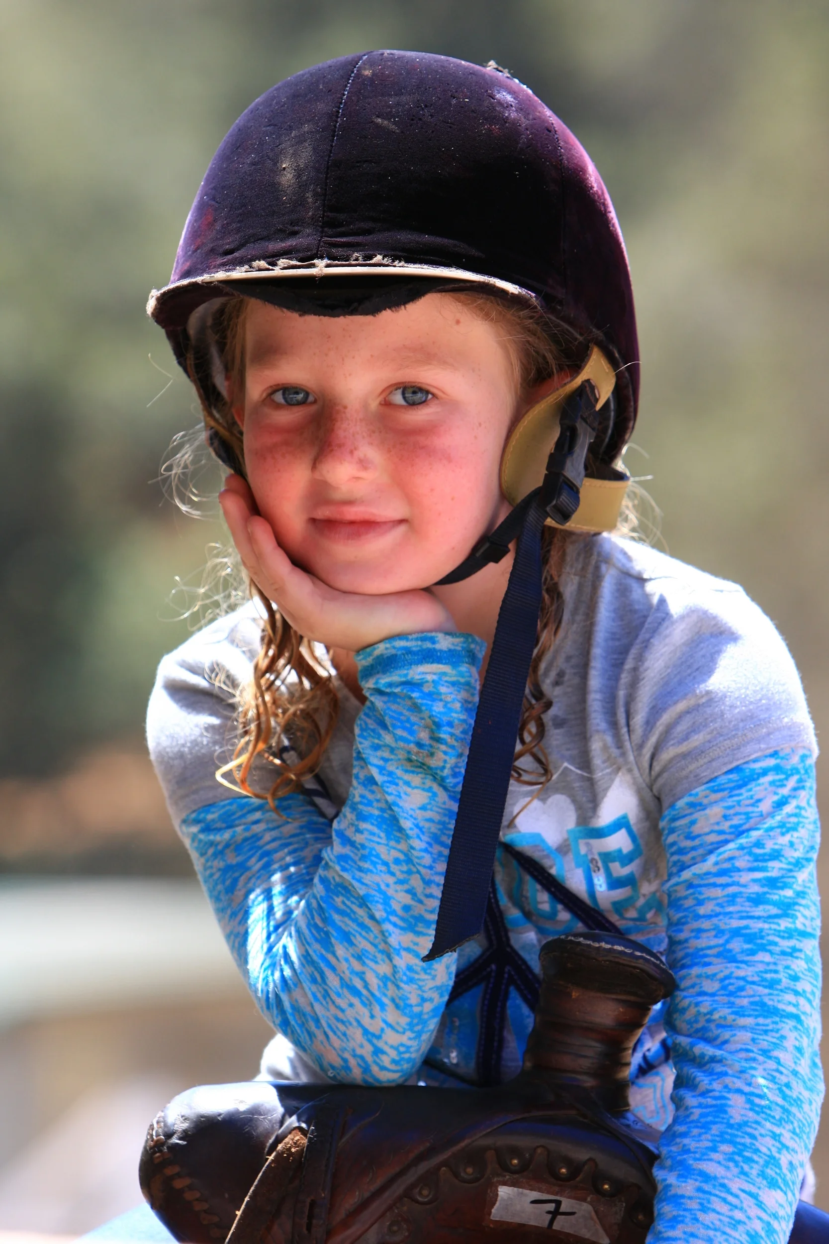 Confident Summer Camper on Horseback