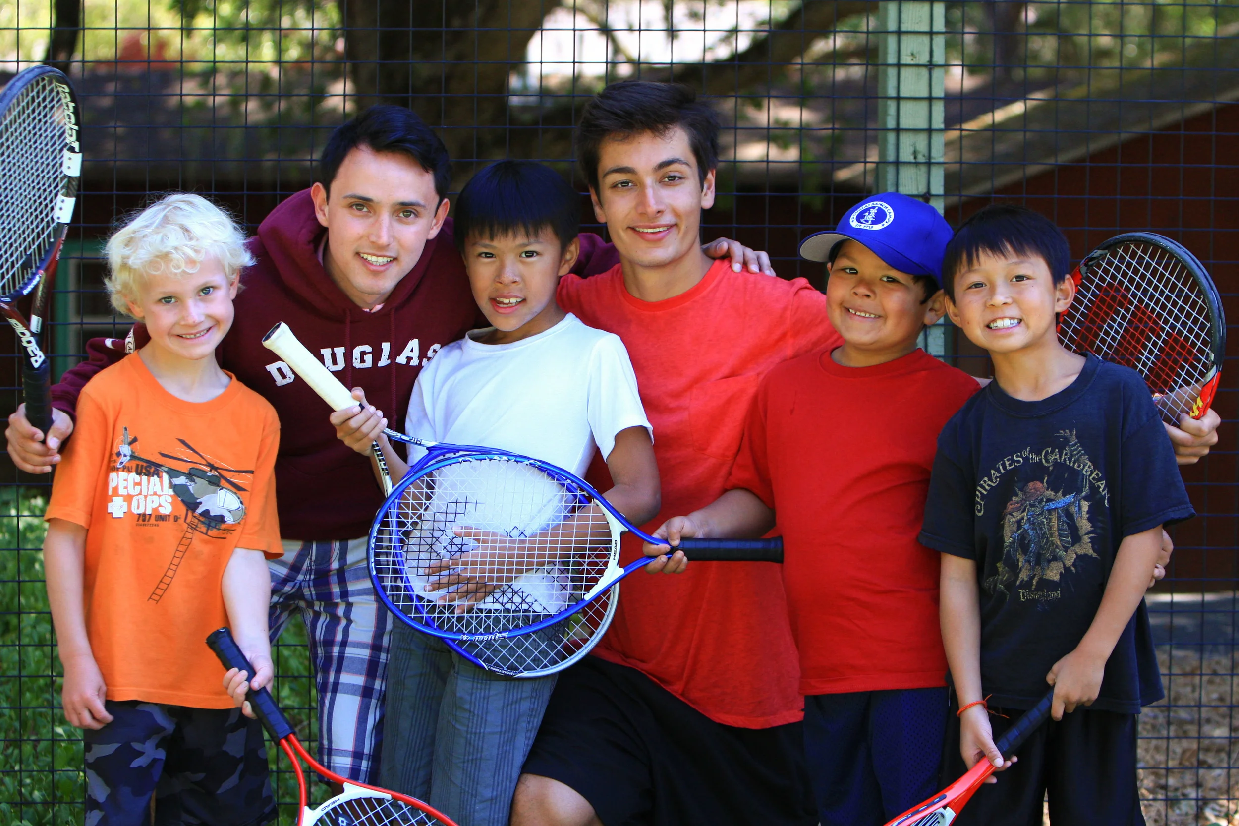 Young Tennis Players at Summer Camp