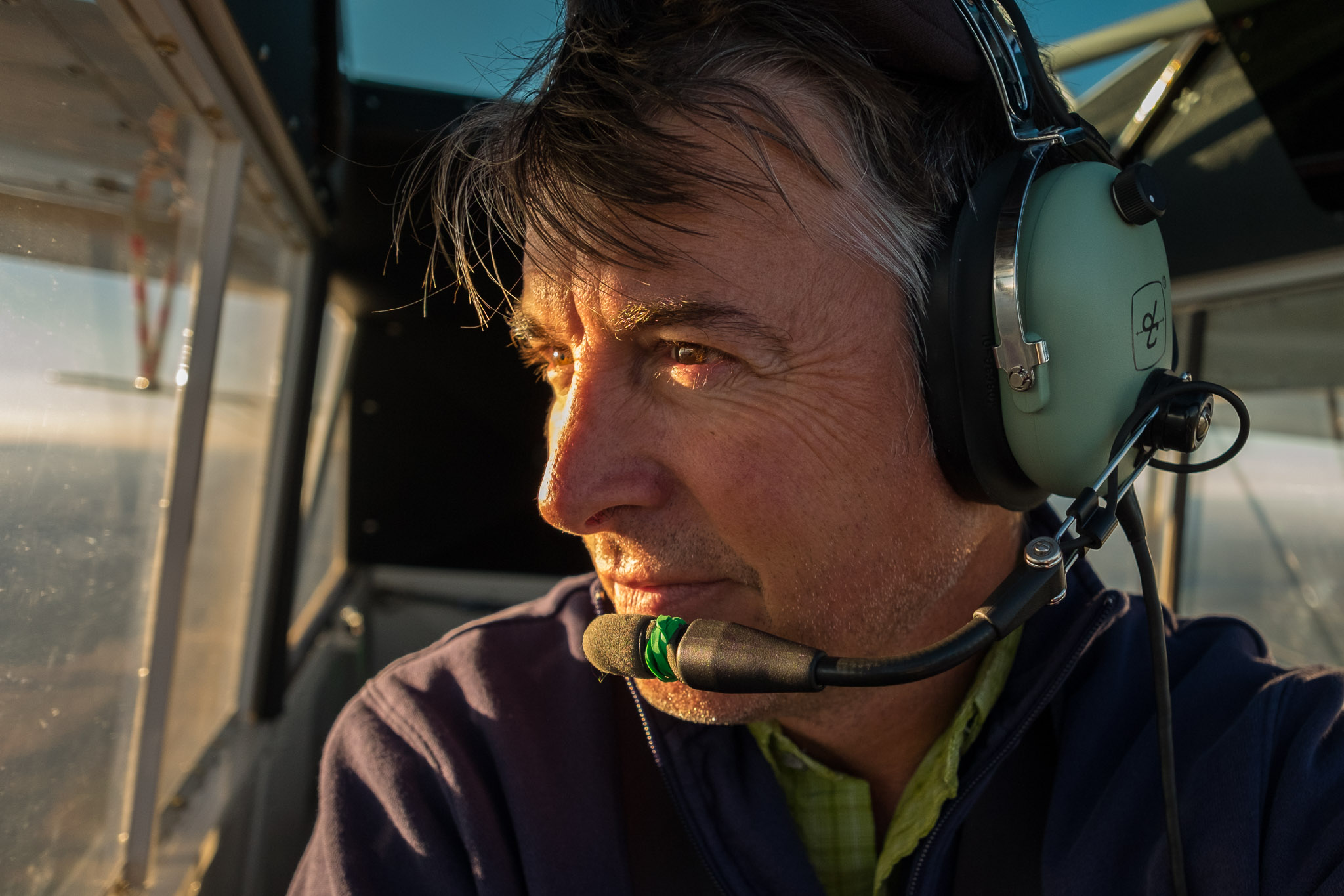 Husky pilot self-portrait at evening golden hour.