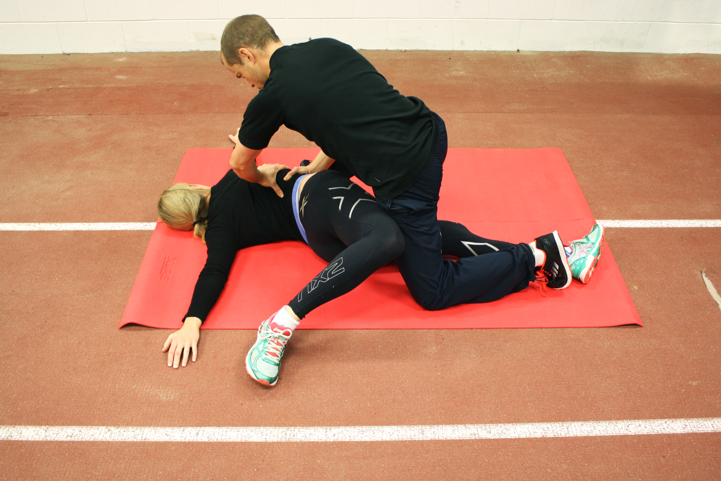 Assisted Prone Thoracic Rotation Cross-over.png