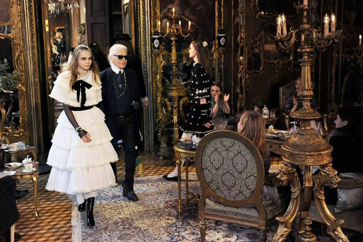 Karl Lagerfeld and Cara Delevingne walking the finale of the Métiers D'Art 2014 show in Salzburg. 