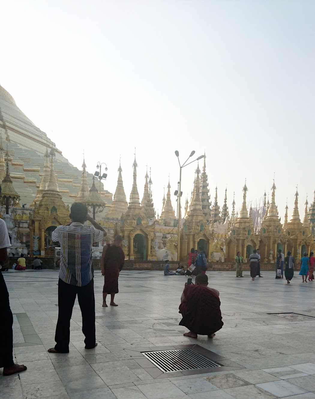 Here's something you don't see every day. A monk with a smartphone taking a photo of another monk holding his smartphone.