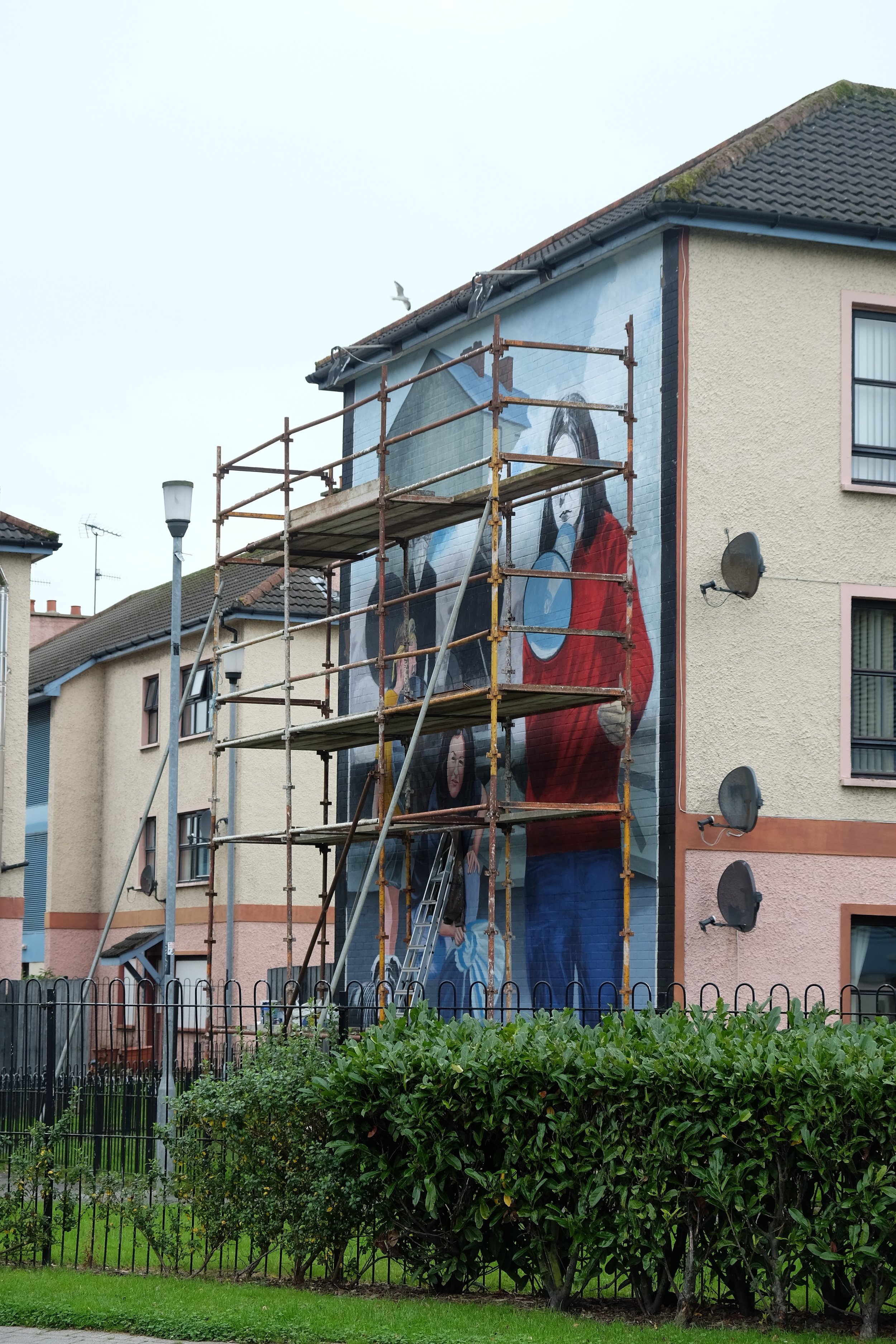 Under renovation when we were in Derry was the famous mural depicting Bernadette Devlin addressing the crowds on the streets of the Bogside. At age 21, she was the youngest MP ever elected to Parliament at the time, and she was convicted of incitement to riot in December 1969.