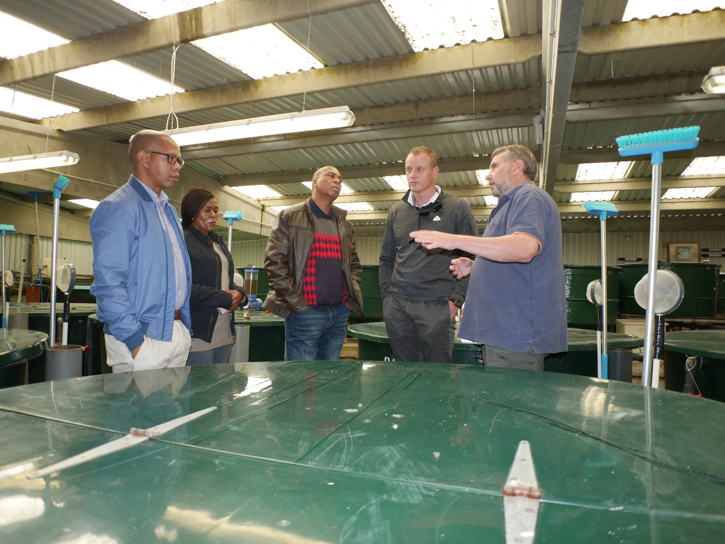  At the Institute's Buckieburn salmonid experimental trial facility with Manager Alistair McPhee