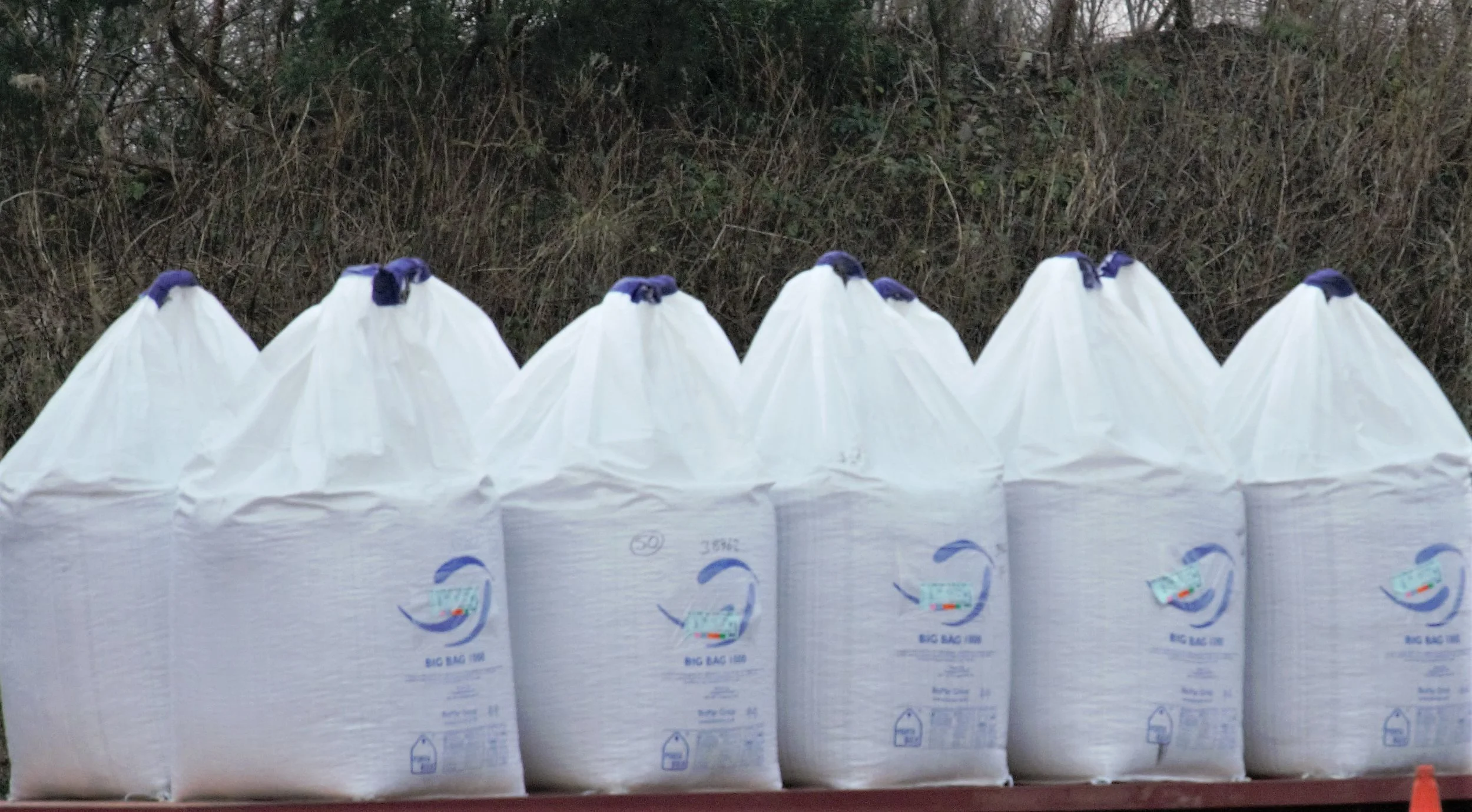 Salmon feed bags ready for transport to cages