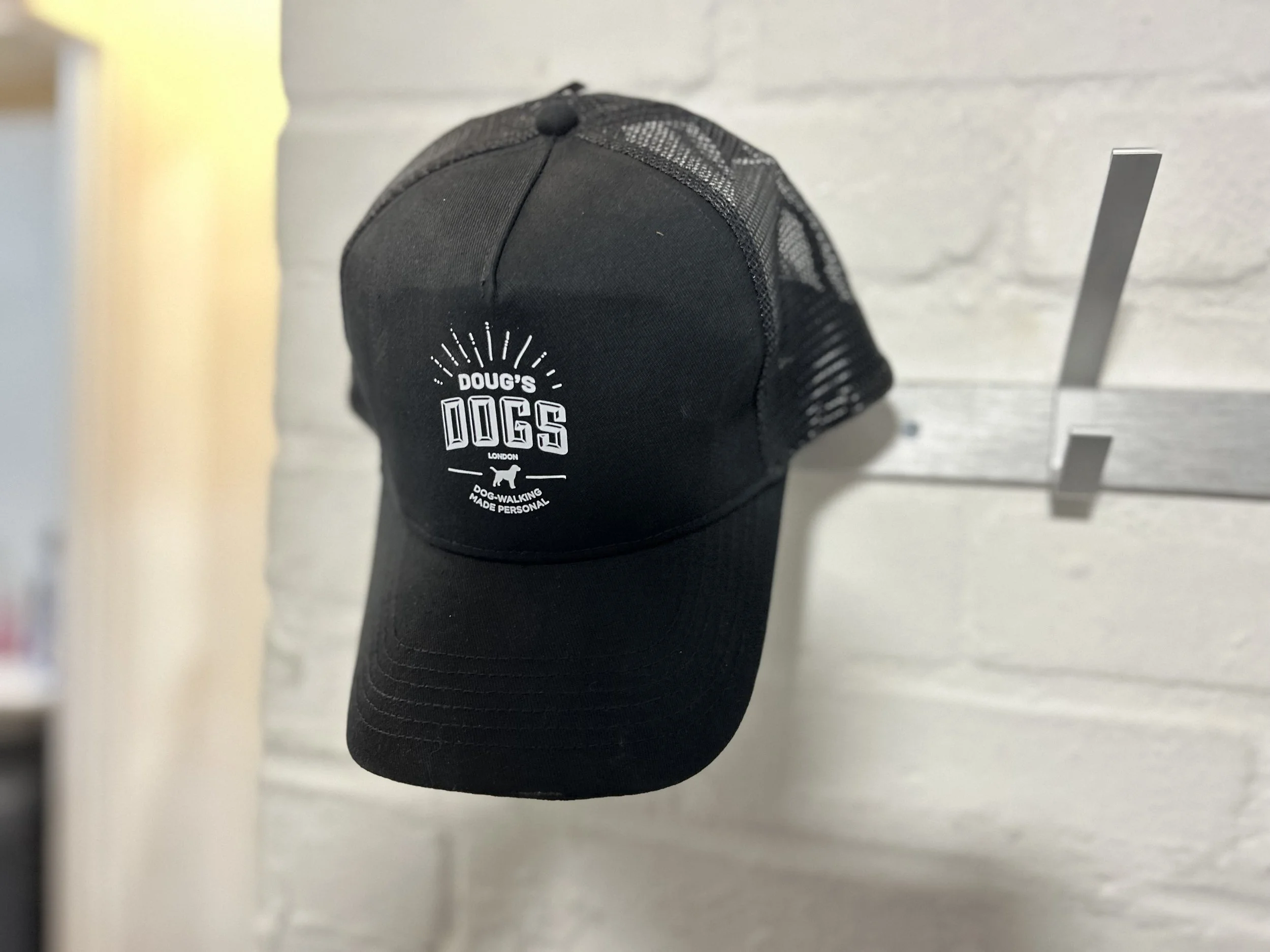 Trucker cap, black, on peg, landscape.jpeg