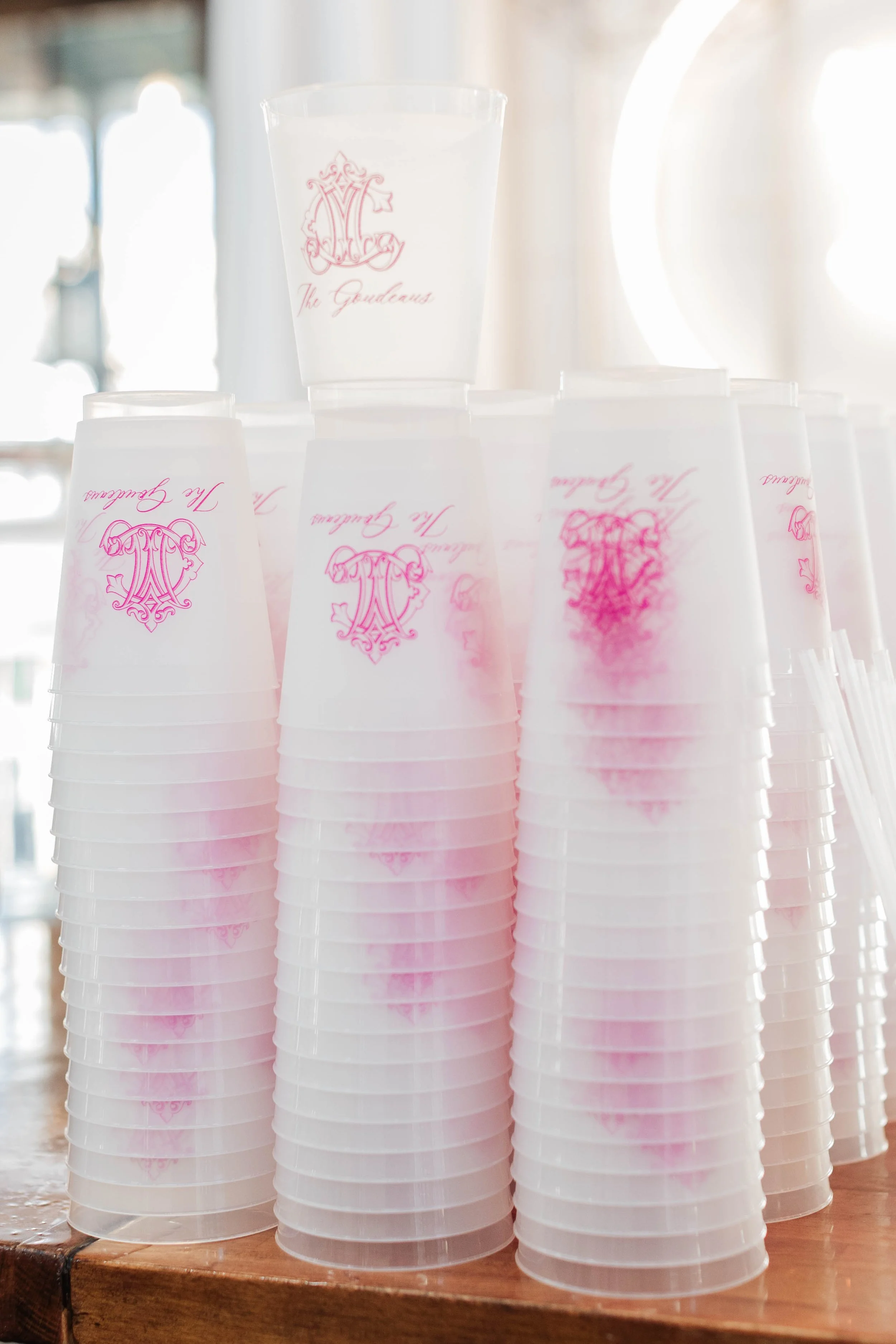 14-pink-ombre-wedding-cups-stacked-at-the-bar-at-the-stone-barn-at-sainte.jpg