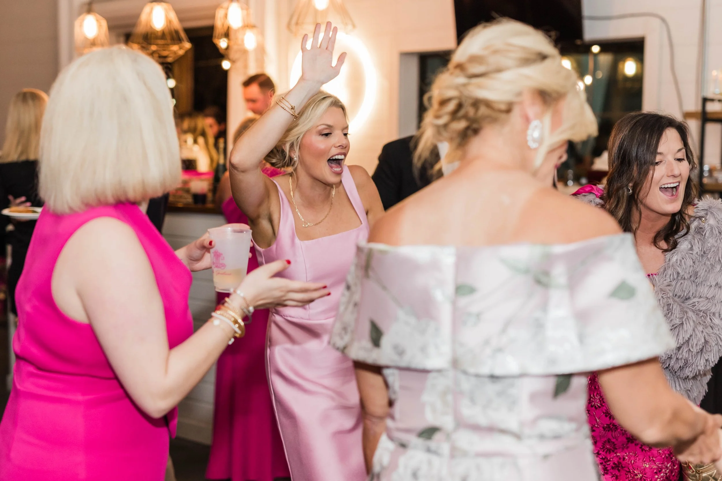 17-guests-dancing-and-laughing-at-a-december-wedding-reception-at-the.jpg
