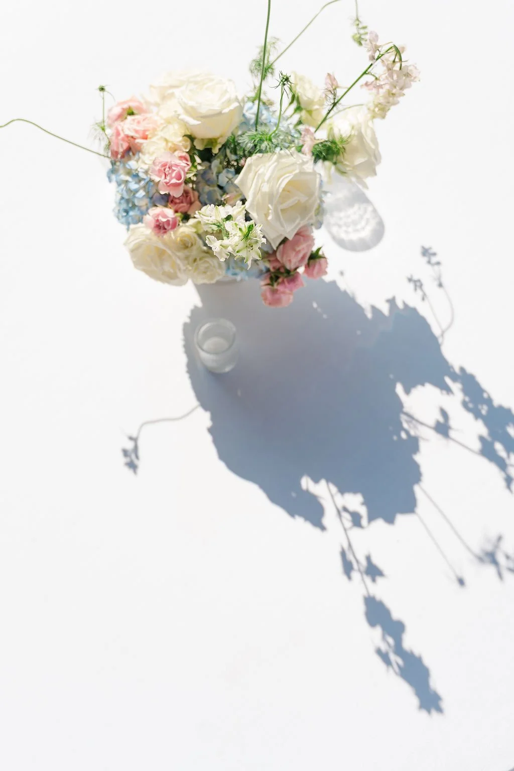 02-white-and-blush-bridal-bouquet-photographed-in-winter-light-at-sainte.jpg