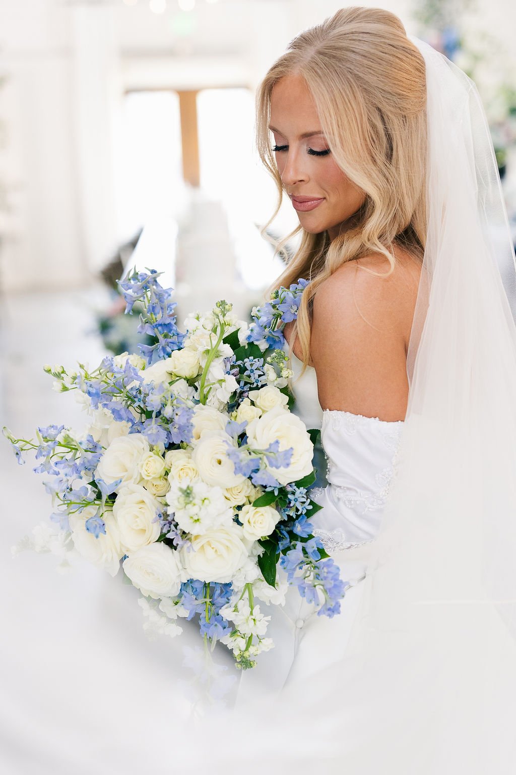 04-bridal-portrait-with-blue-delphinium-and-white-garden-roses-at-sainte.jpg