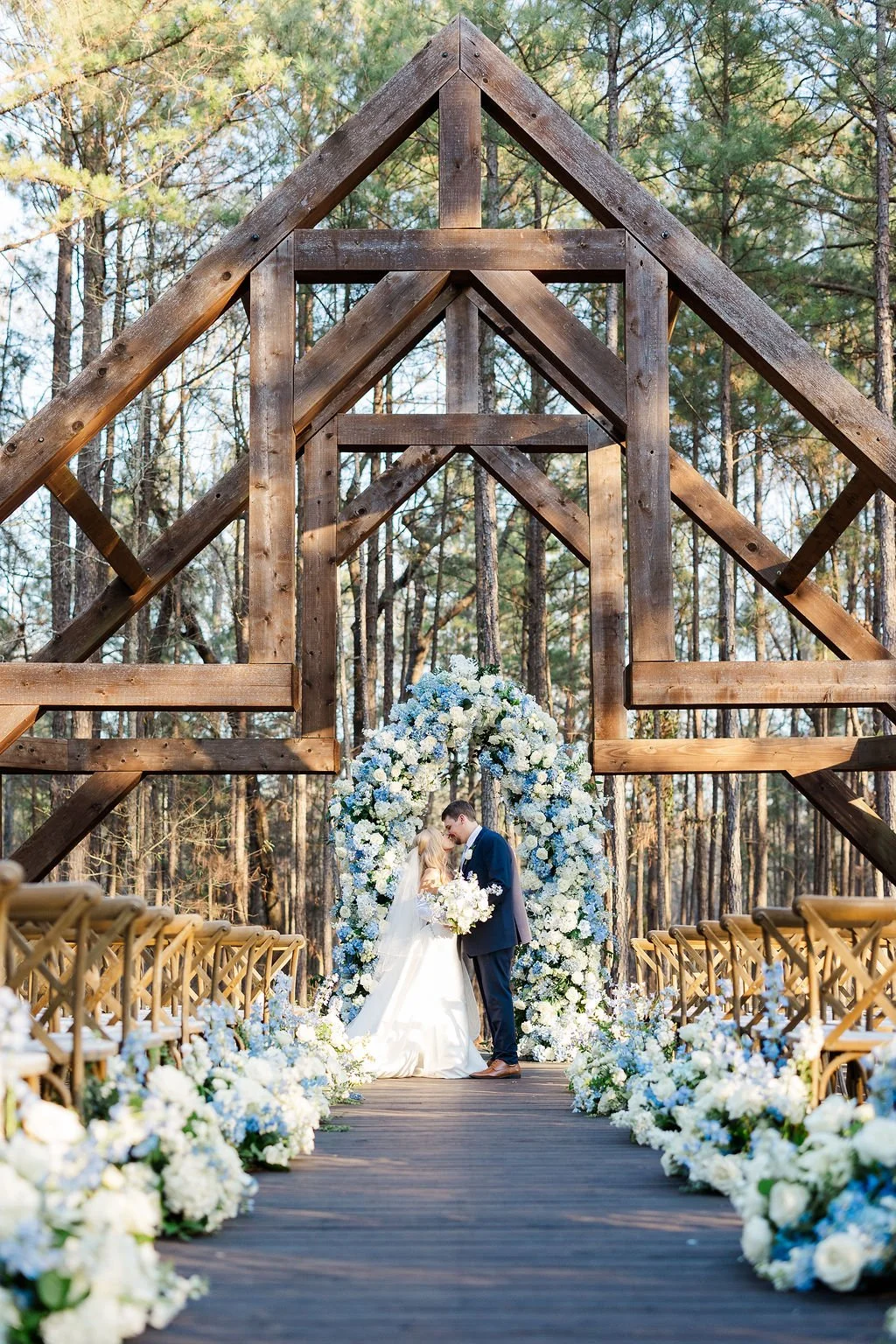 10-wedding-ceremony-under-a-blue-hydrangea-arch-at-the-sanctuary-open-air.jpg