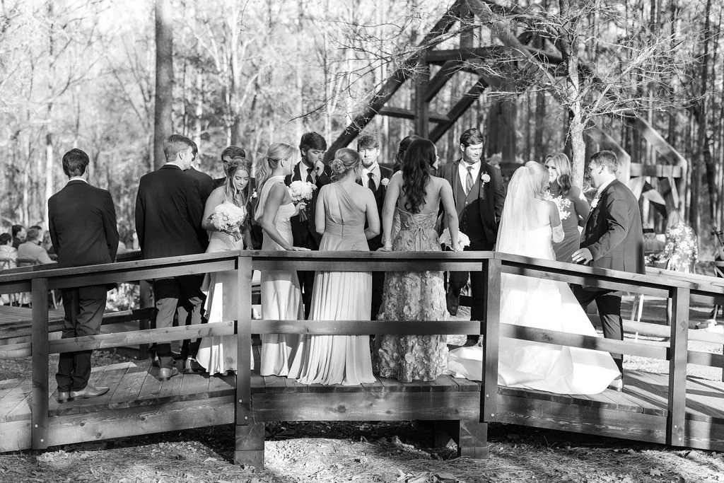 11-black-and-white-photograph-of-the-wedding-party-on-the-bridge-in-the.jpg