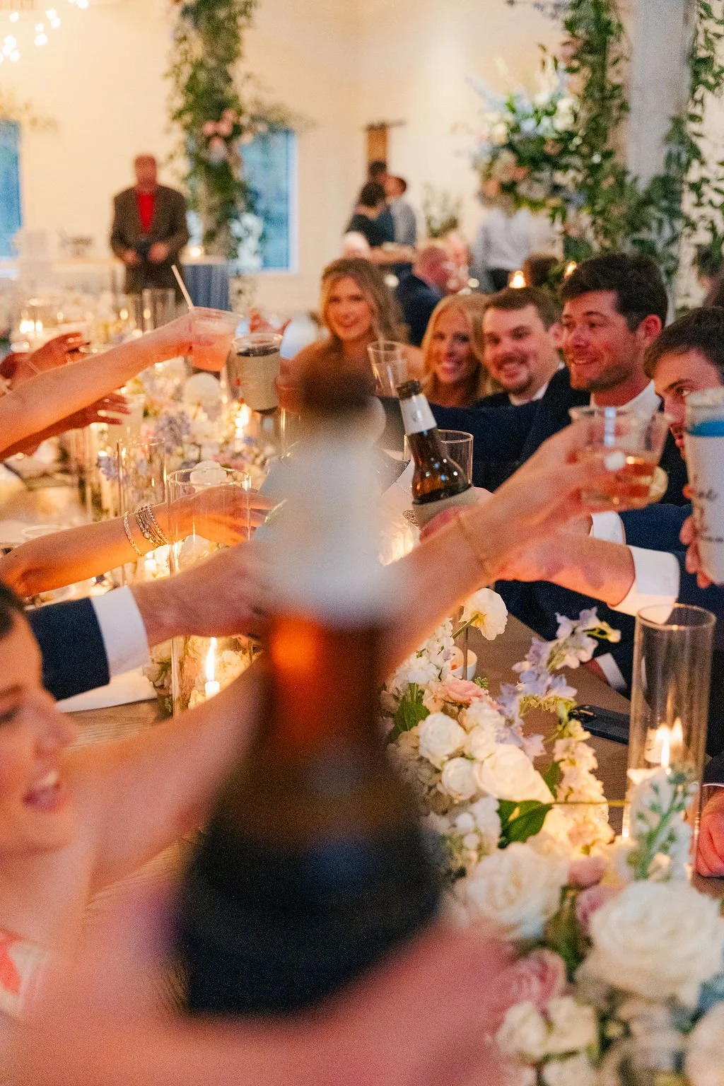 19-guests-raising-a-toast-at-a-february-wedding-reception-at-the-stone.jpg