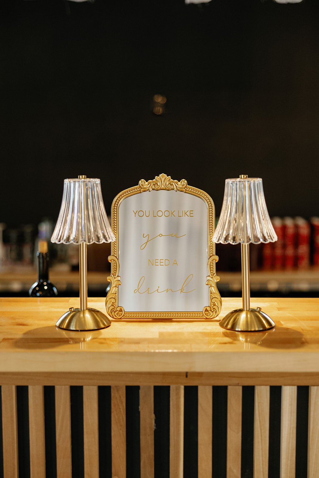 11-gold-framed-wedding-signage-with-pleated-lamps-at-the-stables-sainte.jpg
