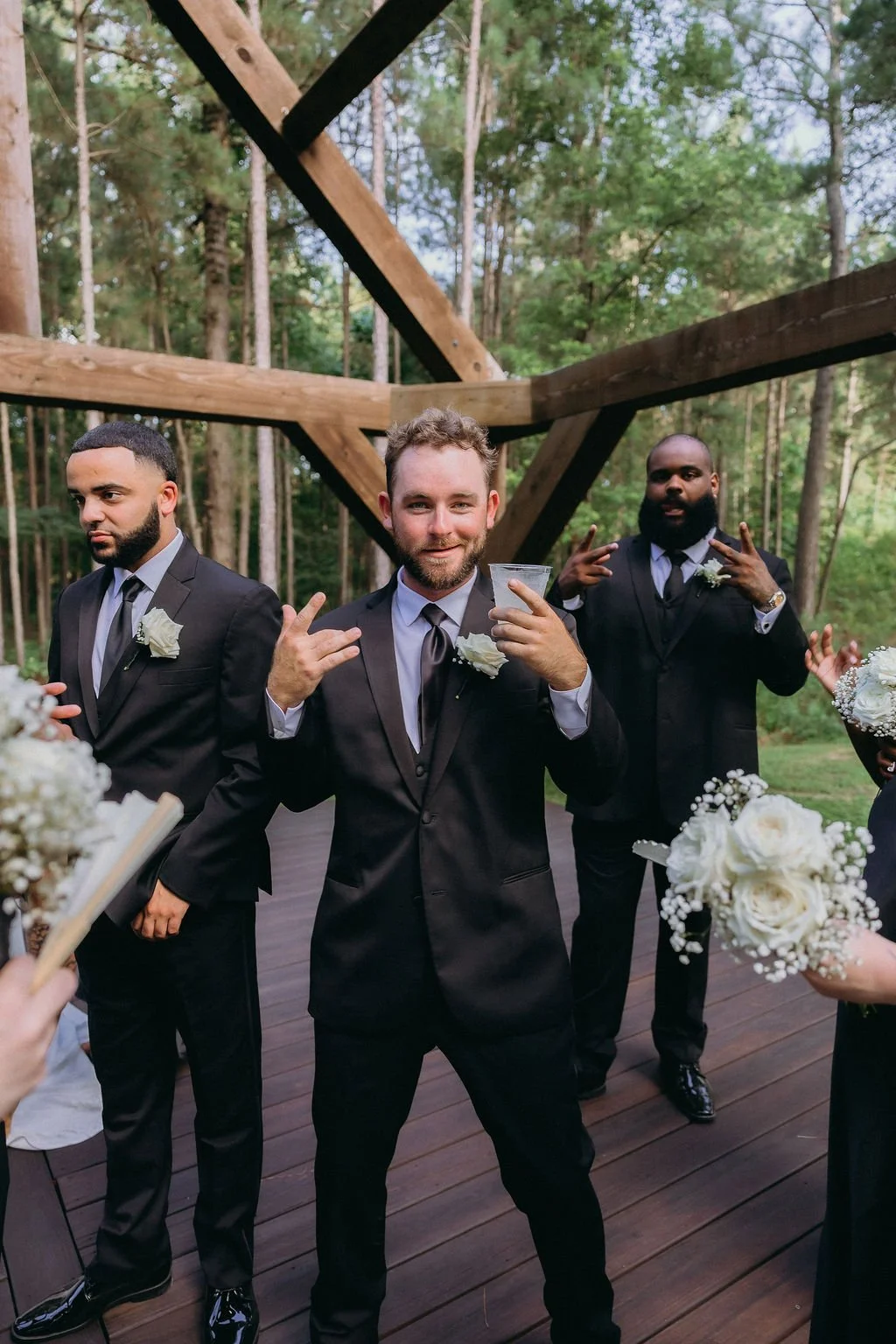 19-groomsmen-celebrating-on-the-boardwalk-after-the-ceremony-at-the.jpg