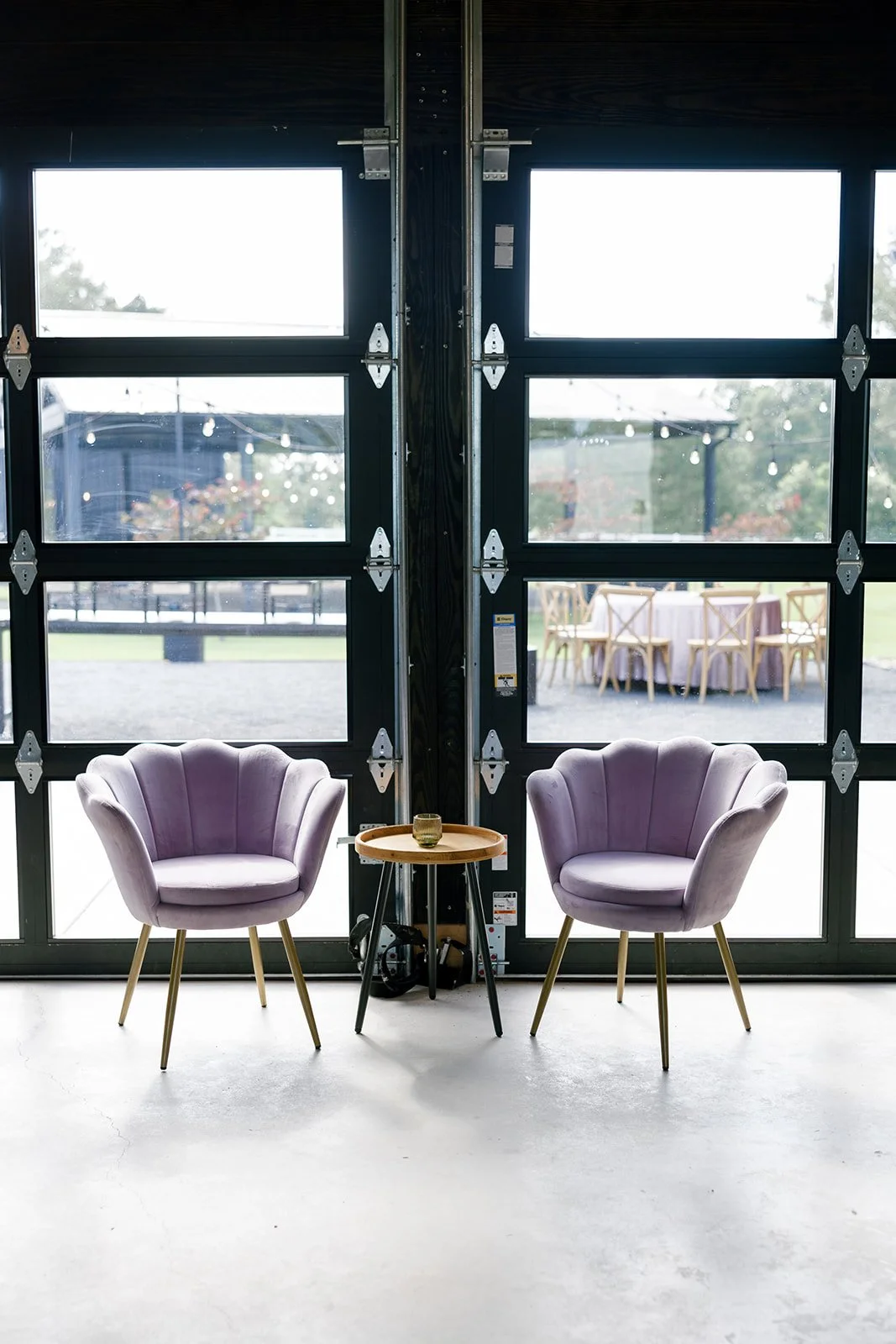 03-lilac-velvet-chairs-against-the-black-glass-doors-at-the-stables-at.jpg