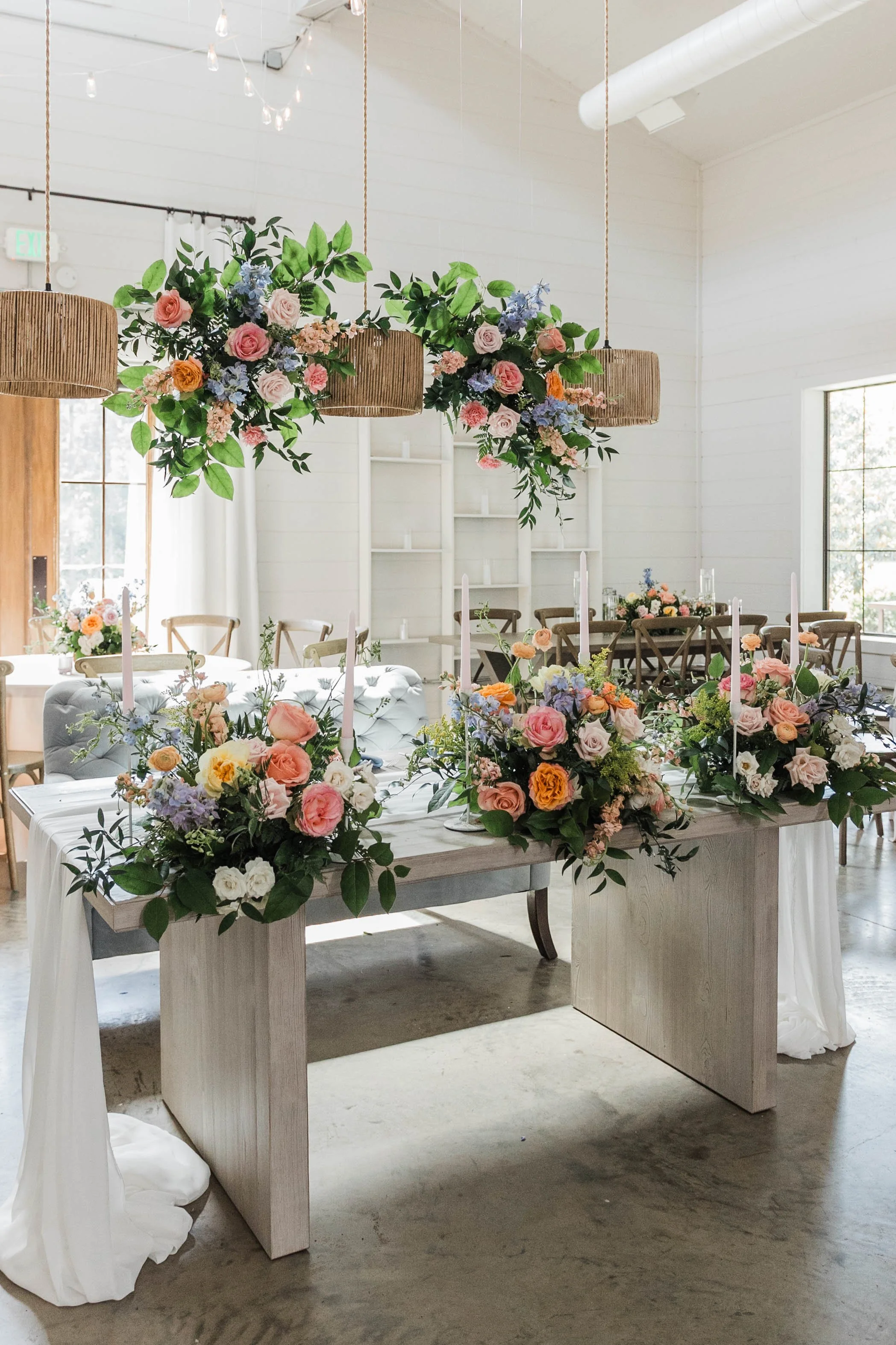 07-sweetheart-table-beneath-a-suspended-floral-installation-at-the-stone.jpg