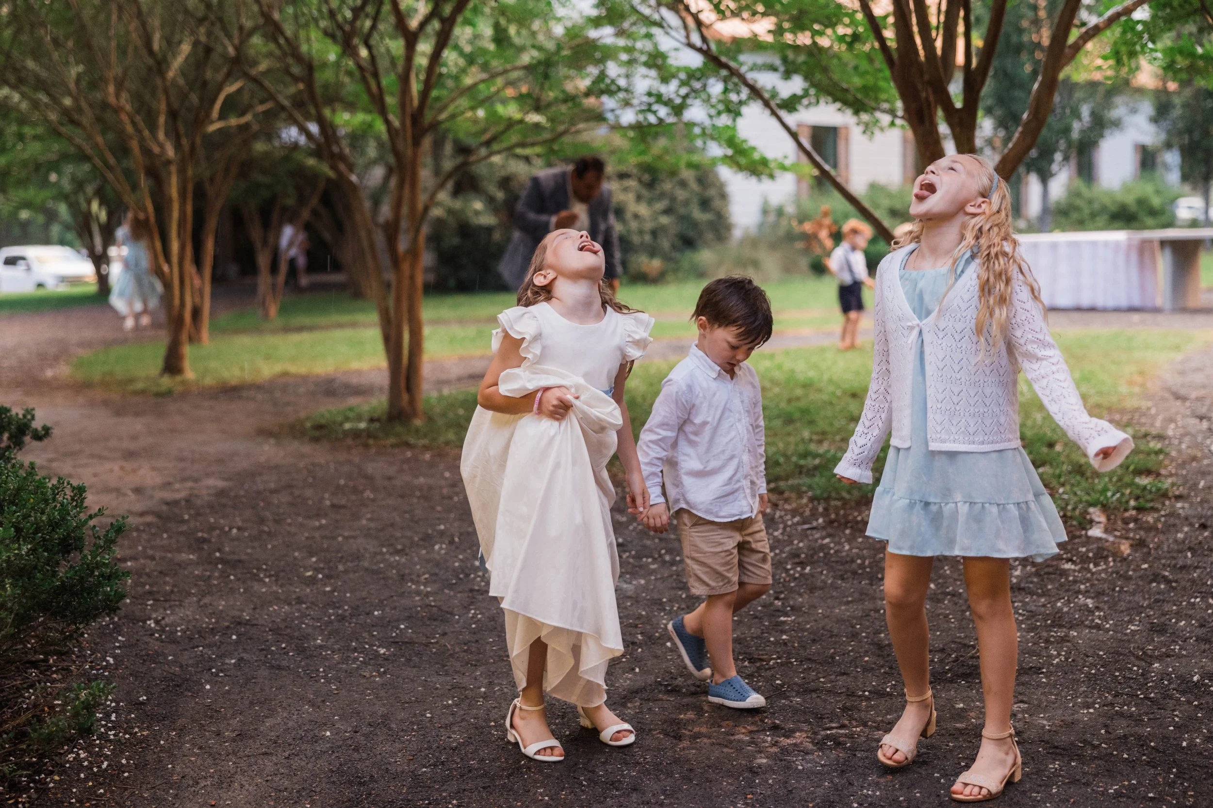 10-children-playing-outside-during-a-spring-wedding-reception-at-the-stone.jpg