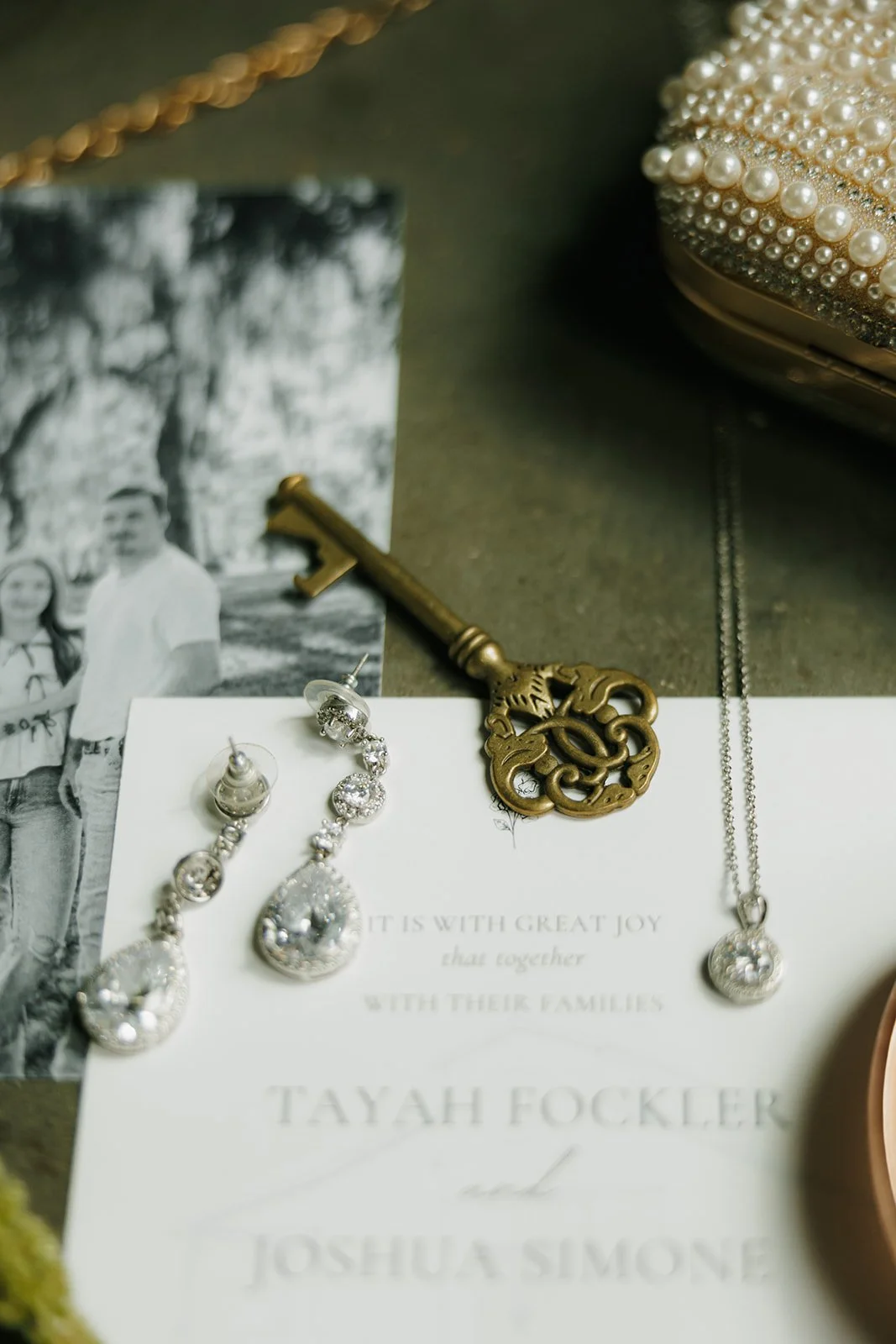 02-bridal-details-with-teardrop-earrings-a-brass-key-and-the-wedding.jpg
