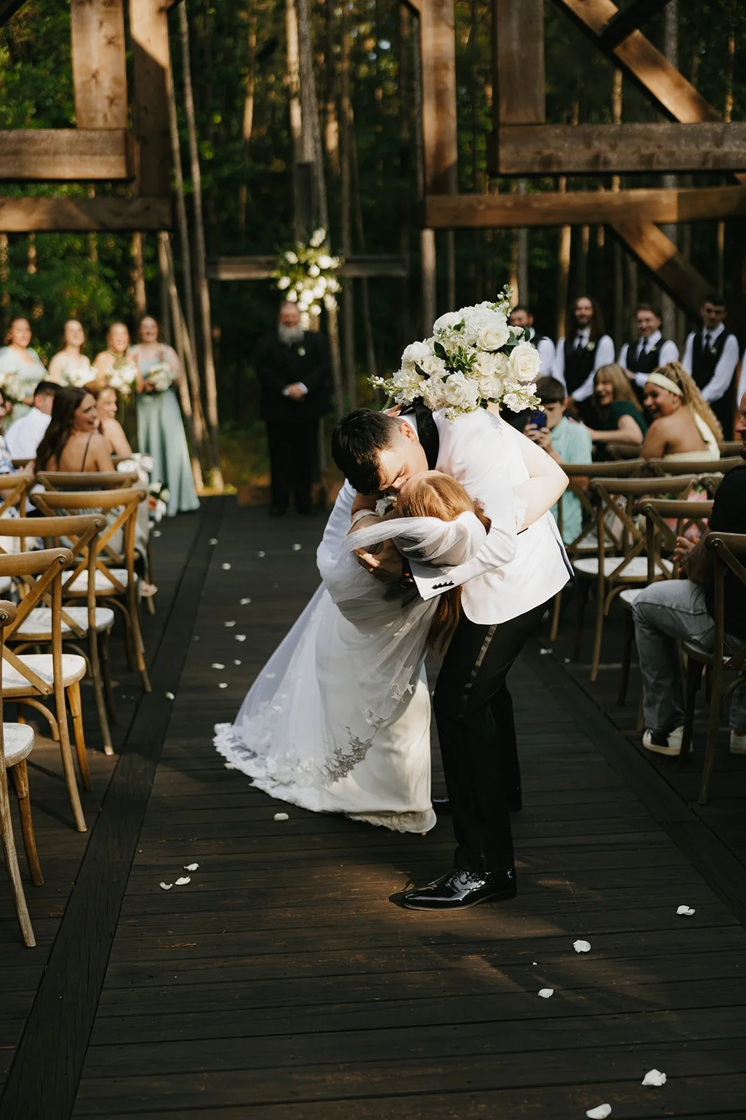 14-groom-dipping-the-bride-for-a-kiss-in-the-aisle-of-the-sanctuary-at-the.jpg