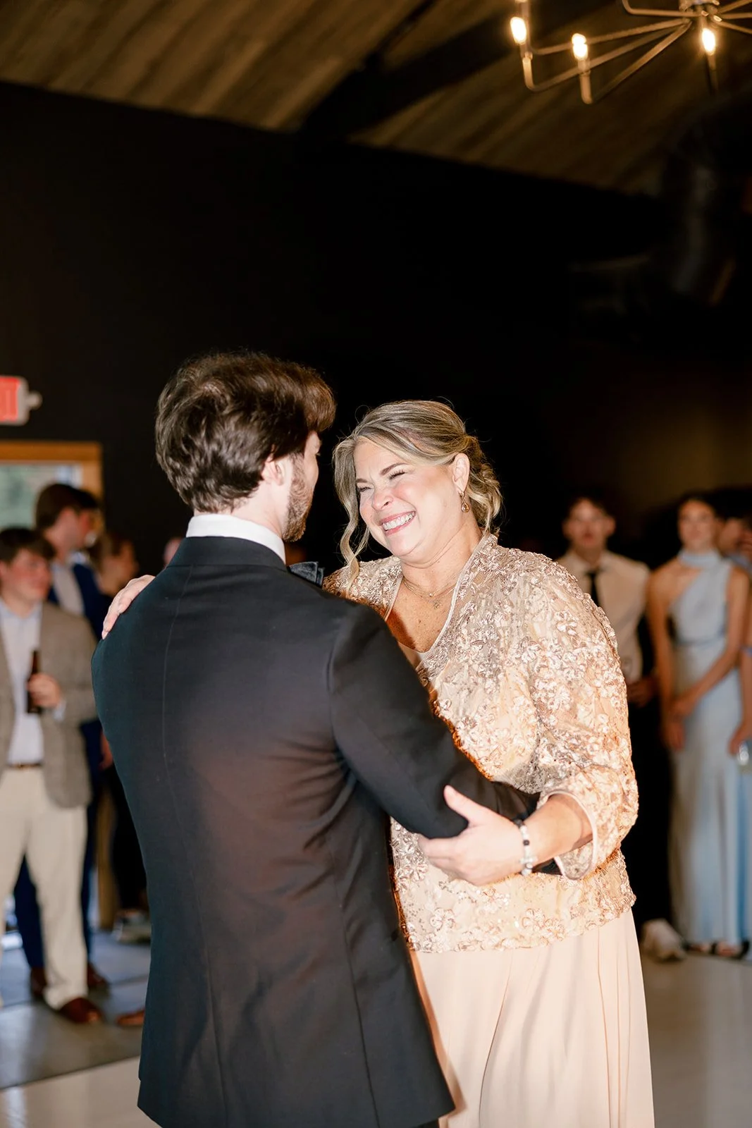 16-groom-dancing-with-his-mother-at-the-wedding-reception-at-the-stables.jpg