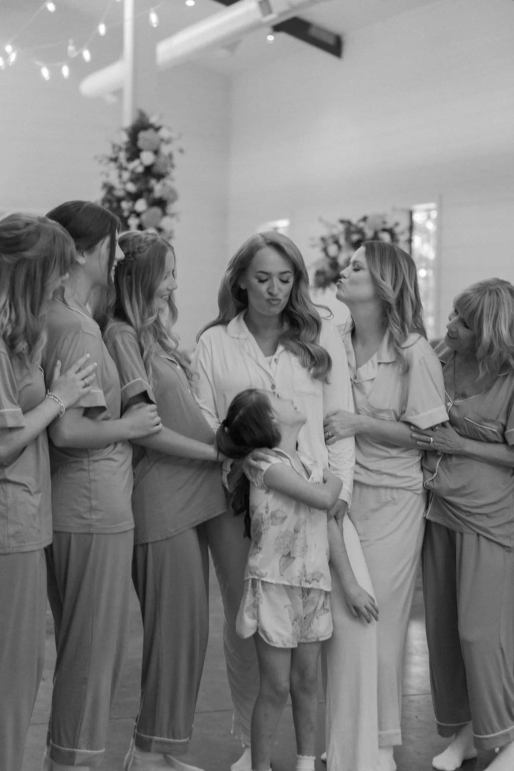 04-bride-bridesmaids-and-flower-girl-in-matching-pajamas-on-the-wedding.jpg