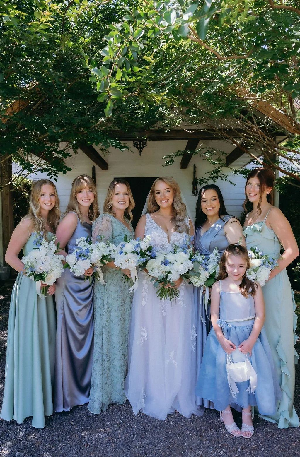 07-five-bridesmaids-in-baby-blue-sage-and-dove-grey-with-the-bride-and.jpg