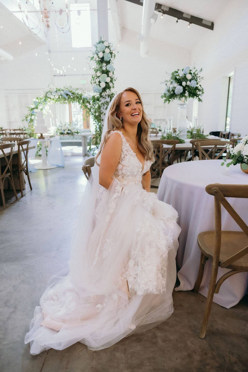 30-bride-in-the-reception-room-set-with-blue-and-white-florals-at-the.jpg