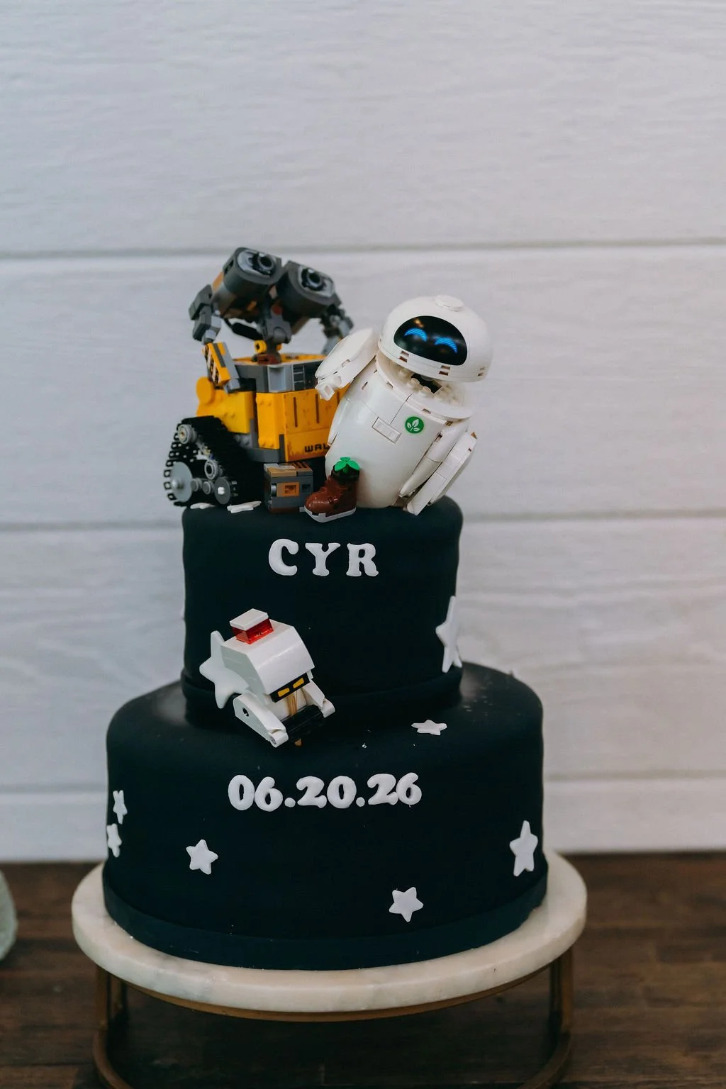 36-black-starry-groom-s-cake-topped-with-wall-e-and-eve-at-the-stone-barn.jpg