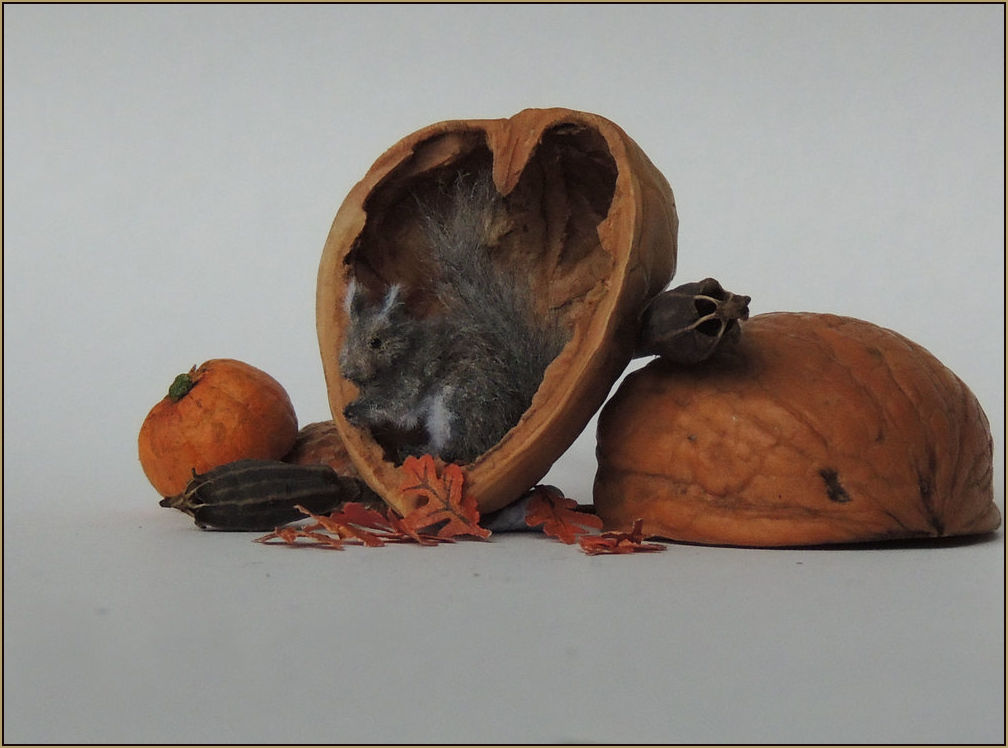   Scale: 1:12    Medium: Polymer clay/ mixed media sculpture made with synthetic and wool roving.    2017    Prices for grey squirrels start from £75.00 depending on the pose of the sculpture. Price includes postage within the UK.  