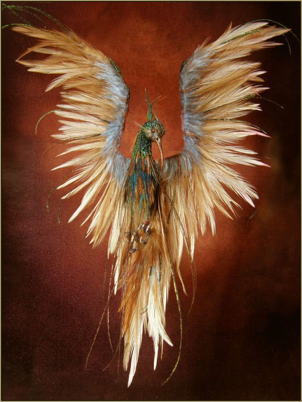     Scale: 1:12th    Medium: Polymer clay &amp; hand painted feathers and wire feet.    Dimensions: 17.5cm including tail and head crest    18.5cm including wingspan    2010      Design Anya Stone  