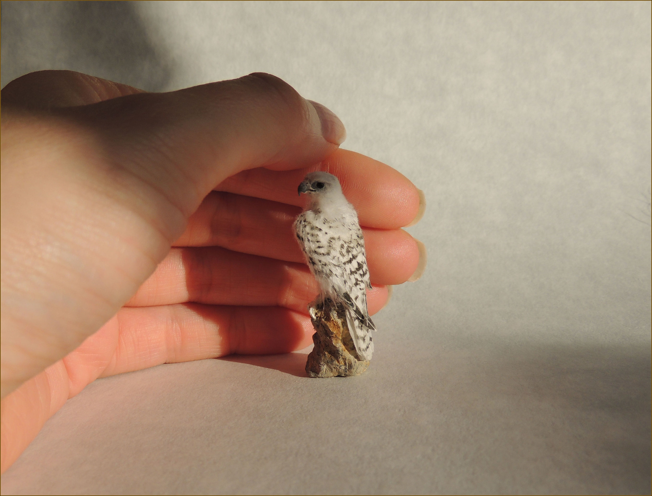  The rock has sculpted from polymer clay and painted to resemble sandstone. 