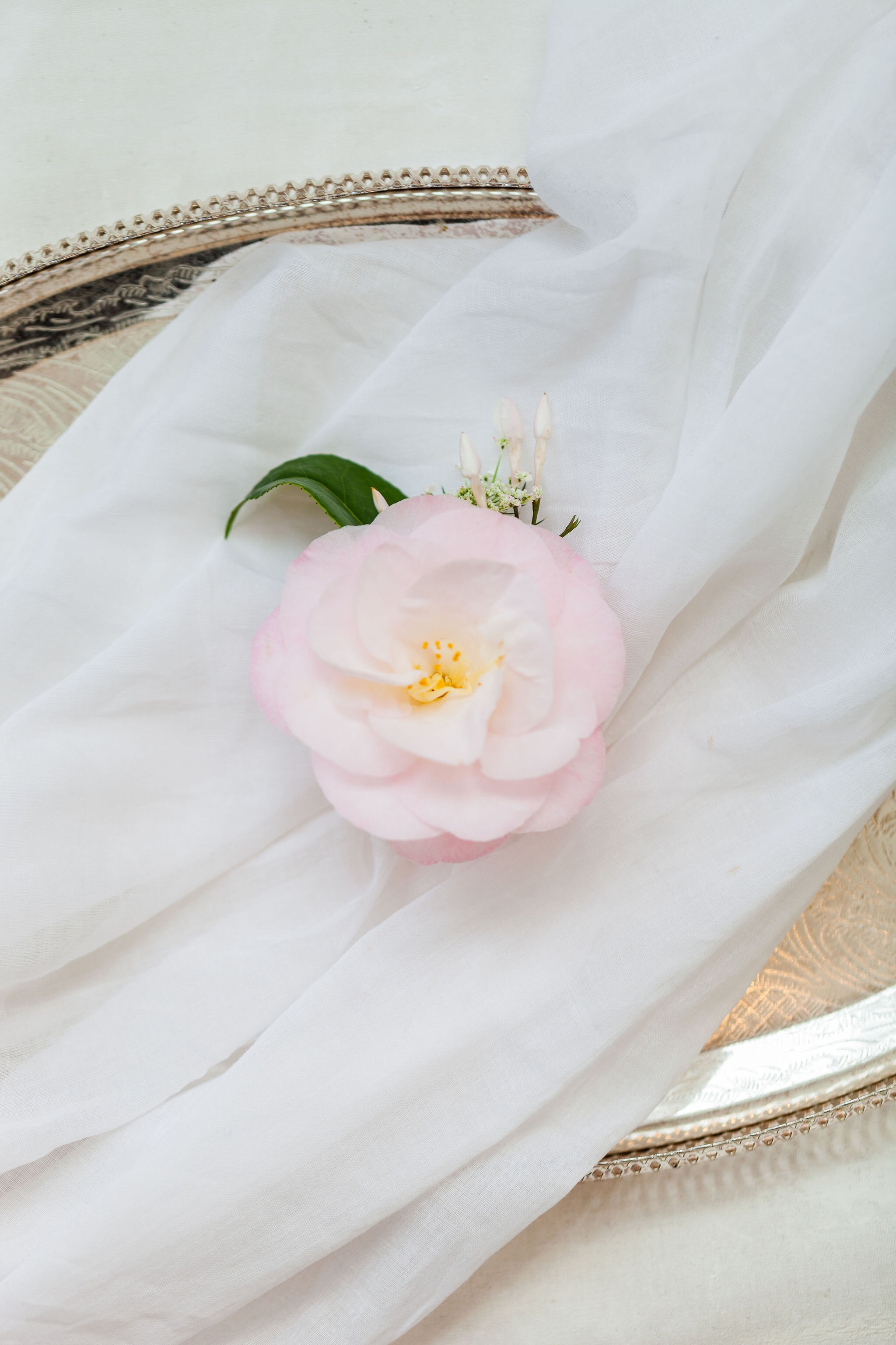 Spring Wedding Buttonholes: Camellia and Jasmine