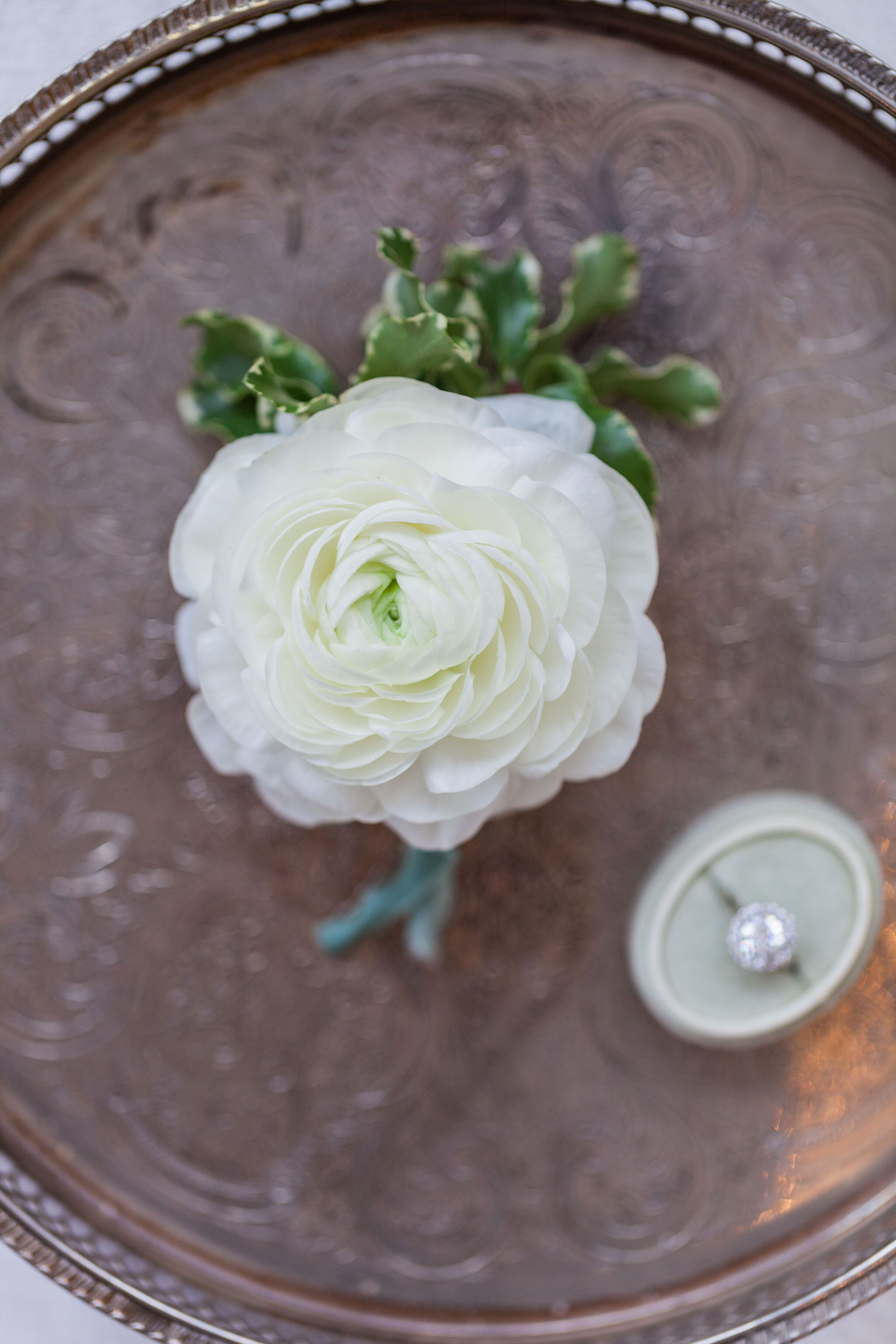 Spring Wedding Buttonholes: Ranunculus and Pittosporum