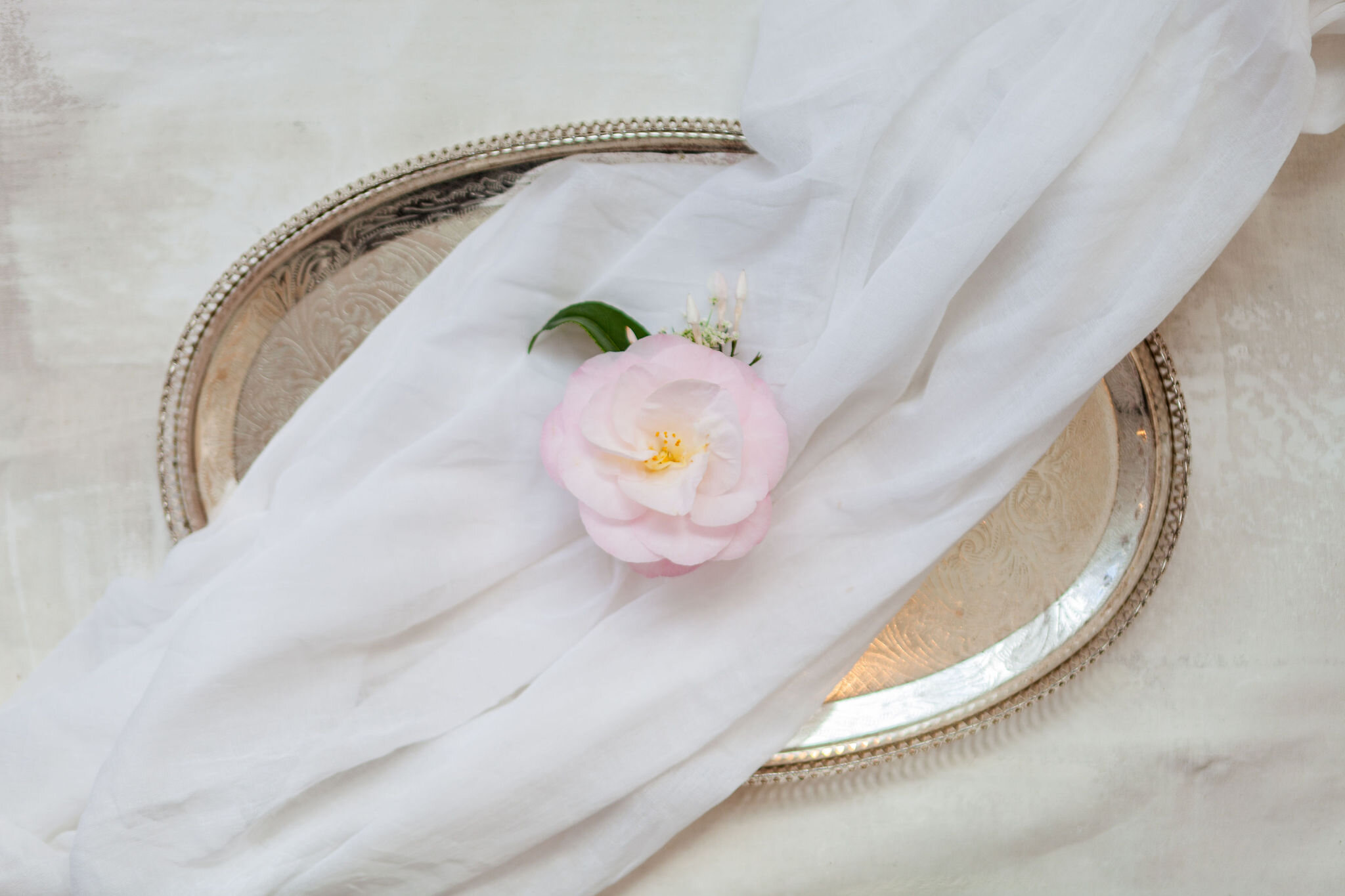 Spring Wedding Buttonholes: Camellia and Jasmine