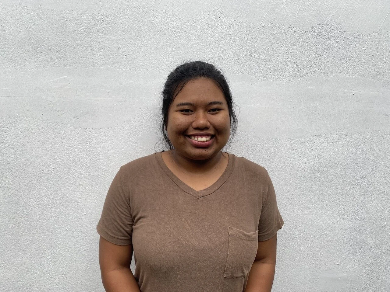   Waraporn Suwantada - Mae   Mae is a social worker and started working as a counsellor with us in 2020. Like Kook, Mae is a fantastic combination between mother and big sister. She helps the children with their homework, comforts them when they are 