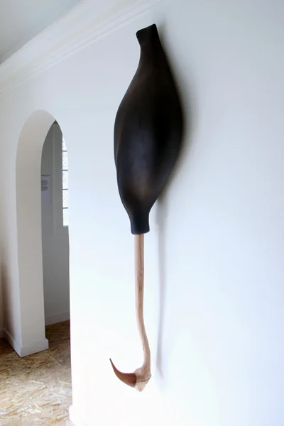   Uncle , 2007  Ceramic, acrylic, ink, fir, mahogany, steel wire  56 x 14 x 10 in 