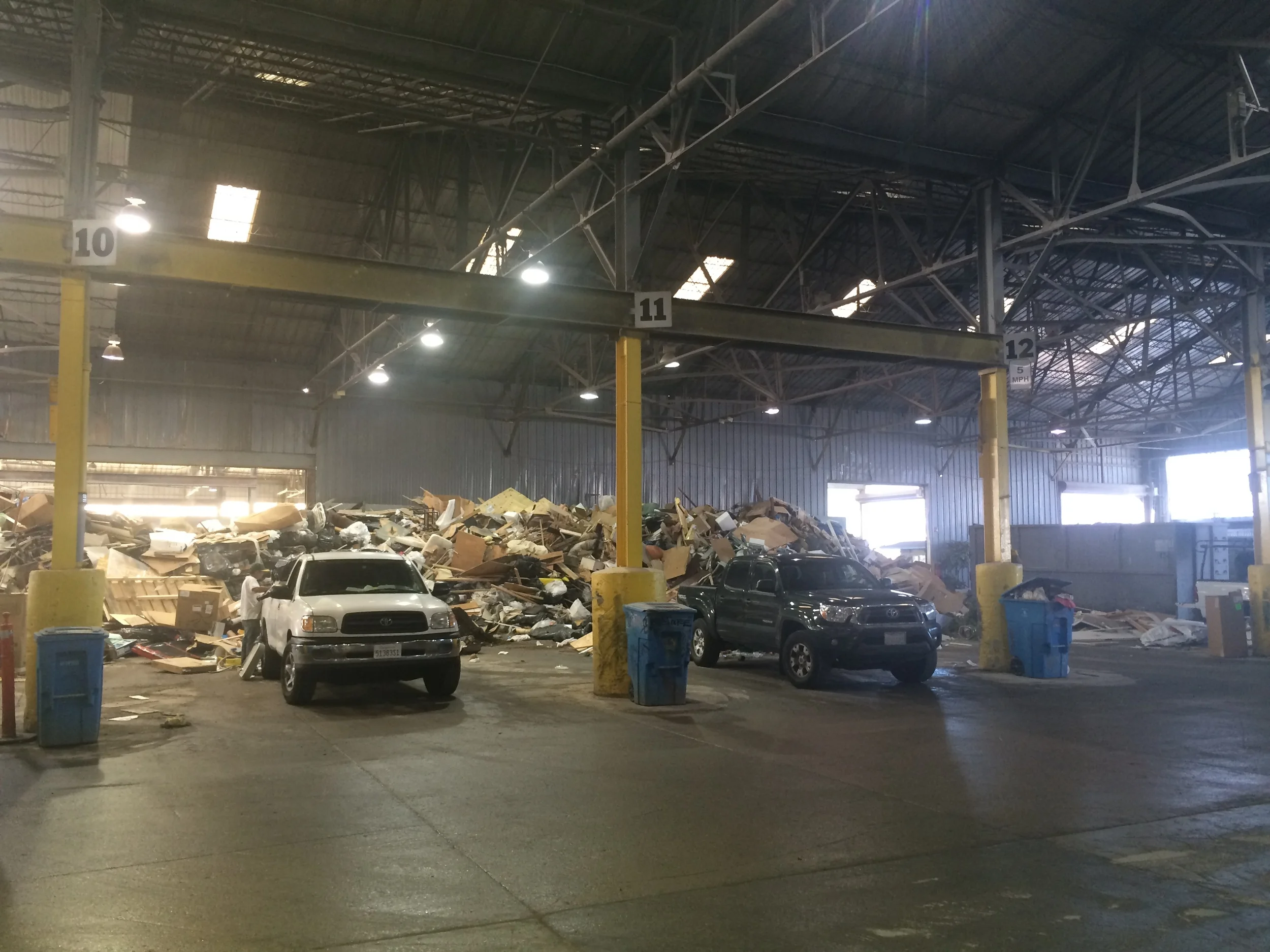 There are 13 bays in the transfer station for people to dispose in. 