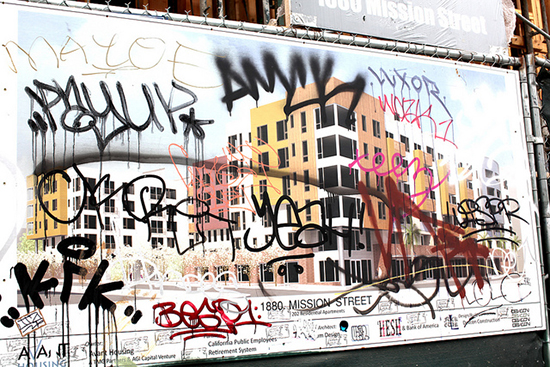 Graffiti on a development rendering in San Francisco's Mission District. Photo by Flickr user Torbakhopper .