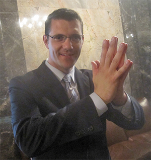 Joe Fain giving himself a high-five after stealing money from the Seattle region to fund wasteful highway projects in rural and suburban Washington.