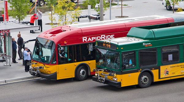 RapidRide and Standard Metro buses, photo from westseattleblog.com .