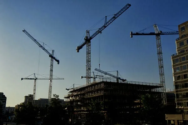 Cranes busy putting up new buildings in Washington, D.C., from Bloomberg .