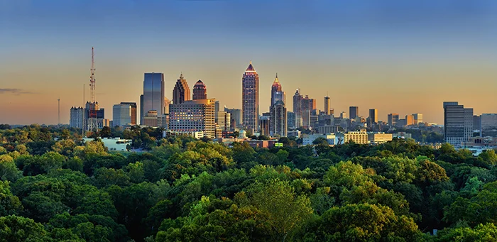 Atlanta skyline. A city with less economic opportunity than many coastal cities, but where owning a home or paying an affordable rent is still within reach to moderate-income households.