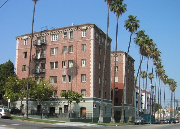 A common example of an existing building that is unlikely to be redeveloped, but will feel pressure to be renovated to appeal to a higher-earning demographic without an adequate supply of new housing—and which could be protected if it were purchased for non-profit ownership and management. This Koreatown apartment building was purchased for $7 million—$127,000 per unit—in 2015. Source: MultifamilyBiz .