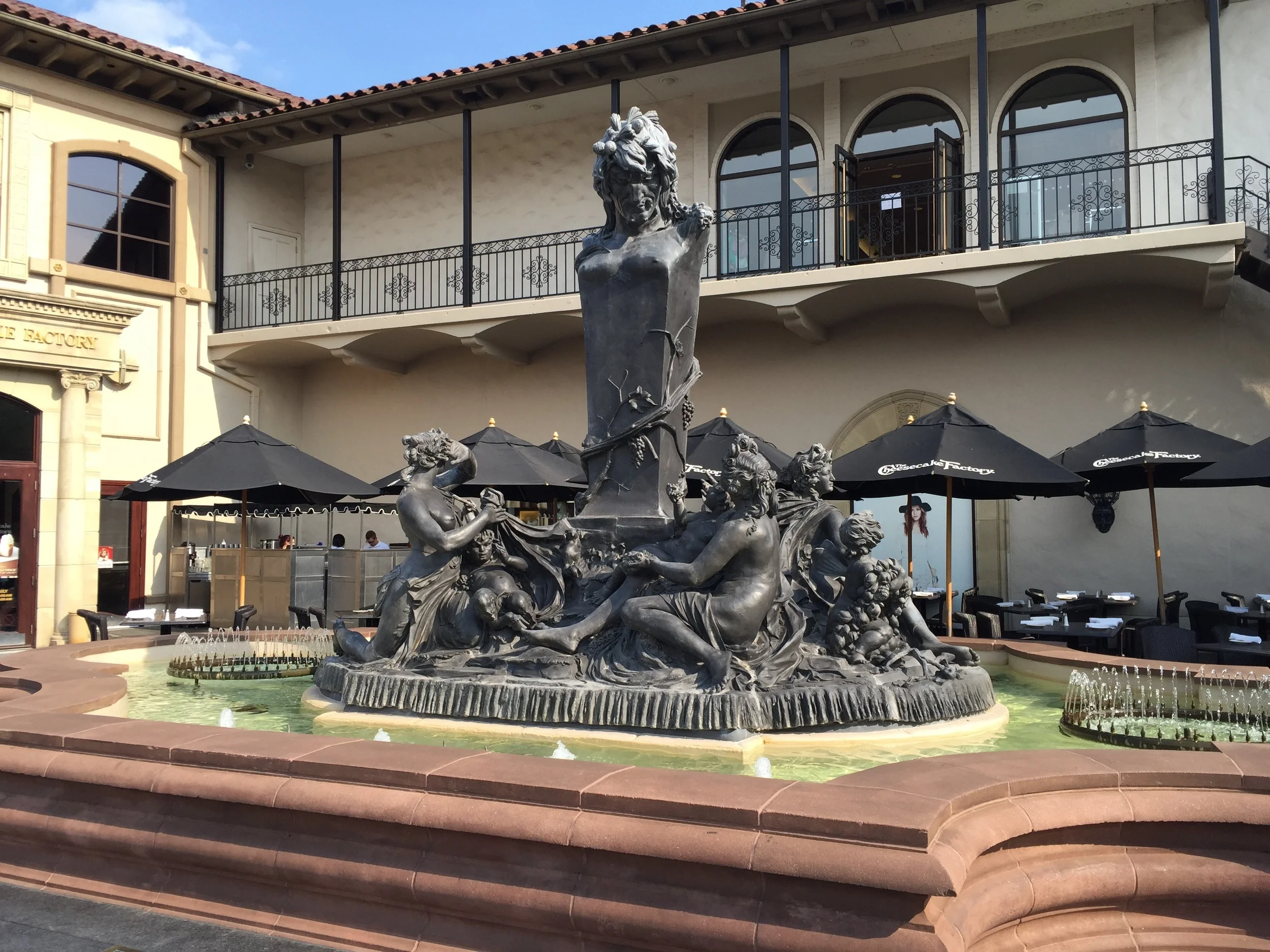 Fountain of Bacchus - the Greek god holding court. 10,000 lbs. of lead purchased in 1960 and installed in Chandler Court right outside The Cheesecake Factory - where I buy all my cheesecake!!