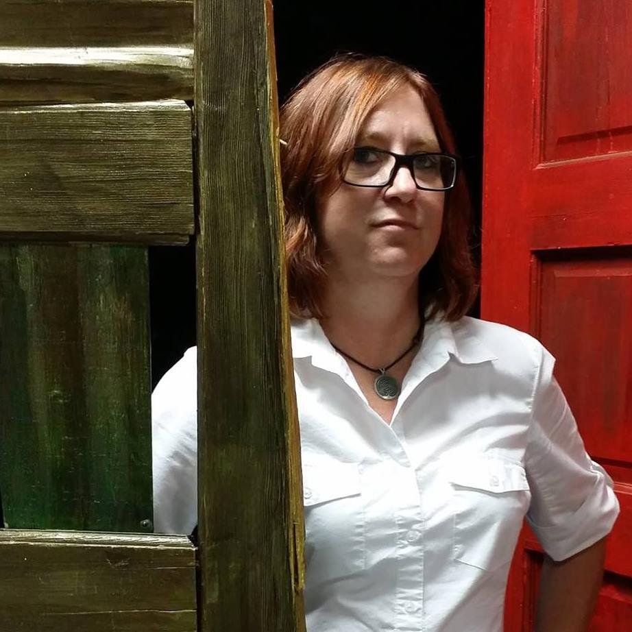 Debra with doors.jpg