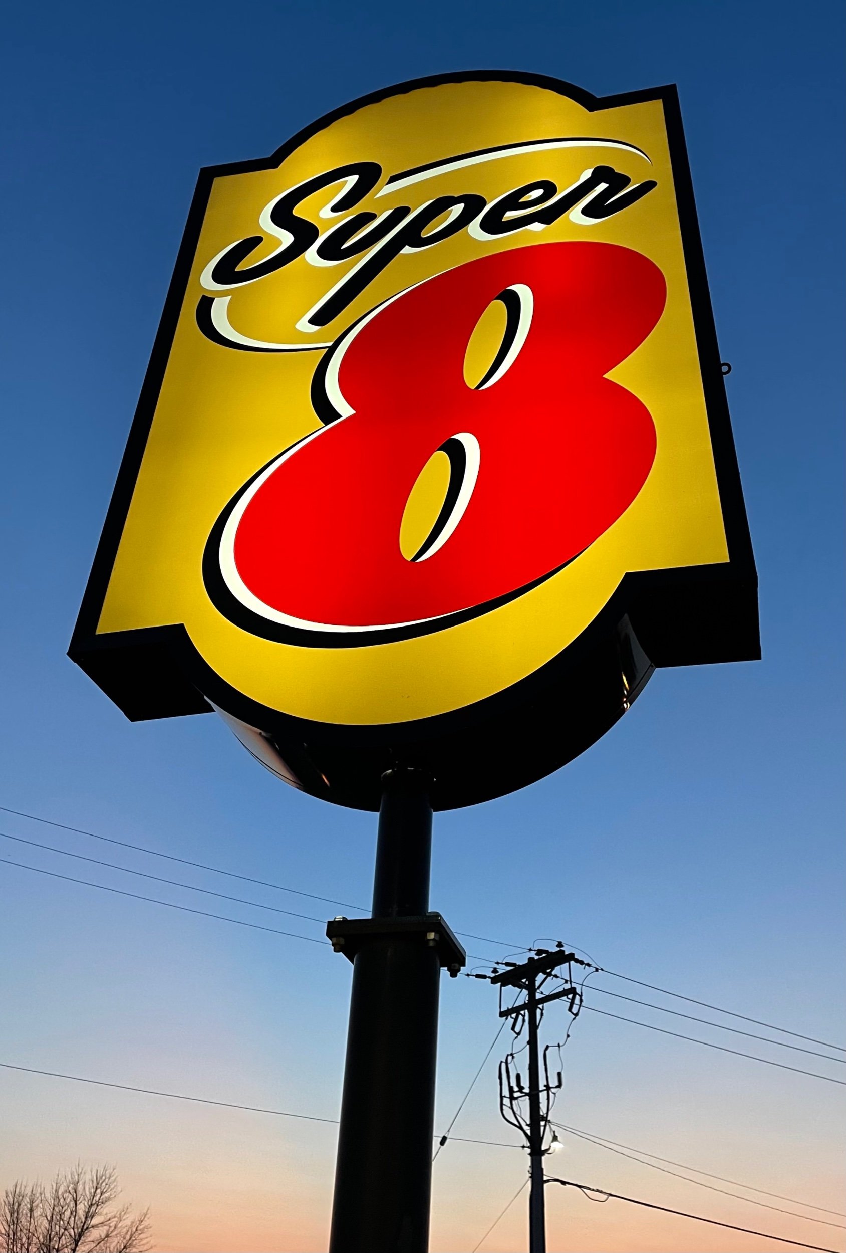  If you’ve met composer Alex Temple, you know she’s fascinated by commercial culture…well, culture in general…and she was stopped dead in her tracks by the sheer size of this Super 8 sign. 