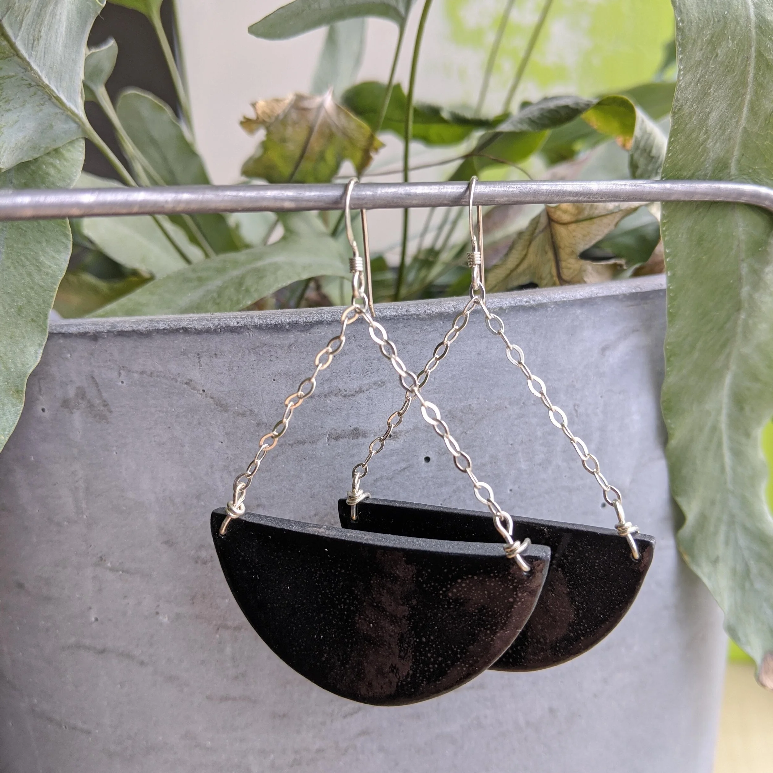 black half circle earrings