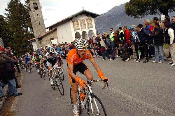 The peloton passes Madonna del Ghisallo